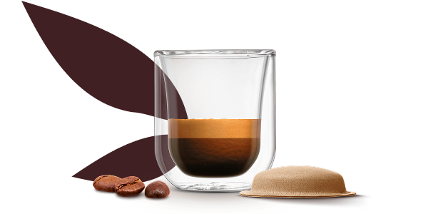 tasse de NEO Espresso Barista à côté d’une capsule en papier  