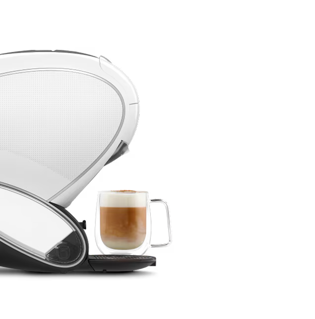 Un duel direct entre une machine à café NEO Latte blanche et une machine NEO Caffè noire. Un doigt d’extraterrestre flotte entre eux.